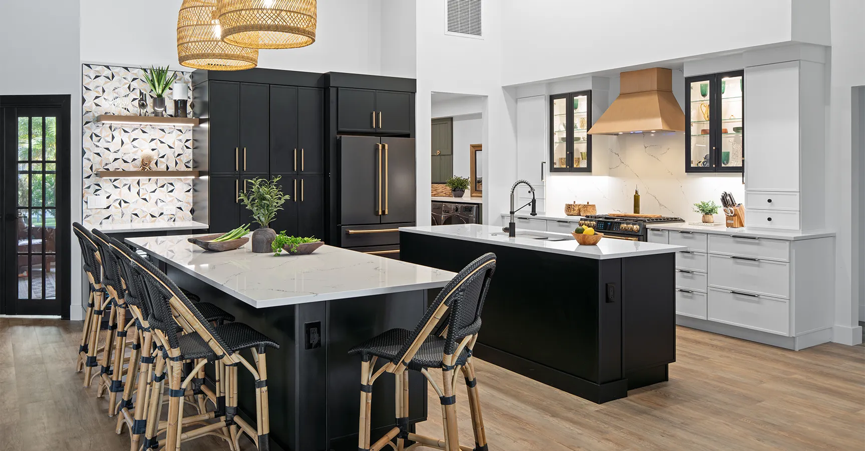 Two-tone Fabuwood kitchen with black and white cabinetry