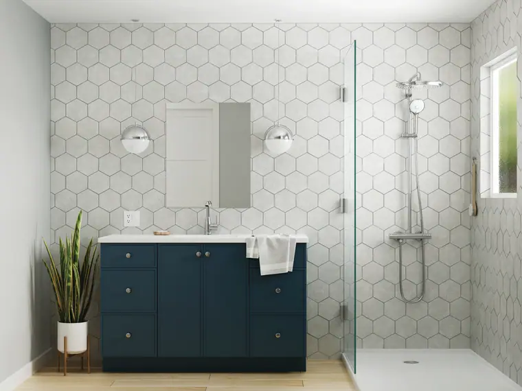 Navy vanity with hexagon tile and a walk-in shower