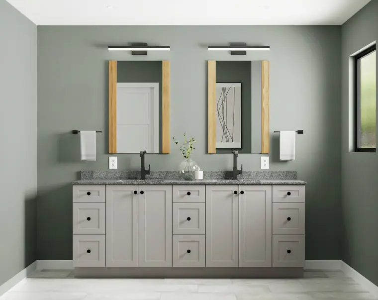Sage-green double vanity in a spa bathroom