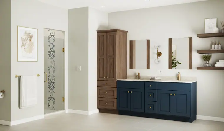 Spa bathroom with a wood-and-navy vanity, storage tower, and glass shower
