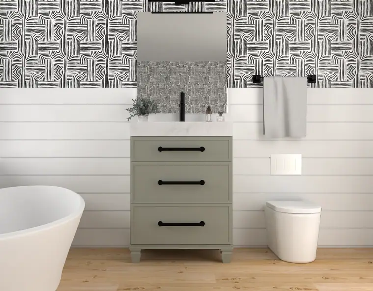 Sage-green Fabuwood vanity with shiplap and a freestanding tub