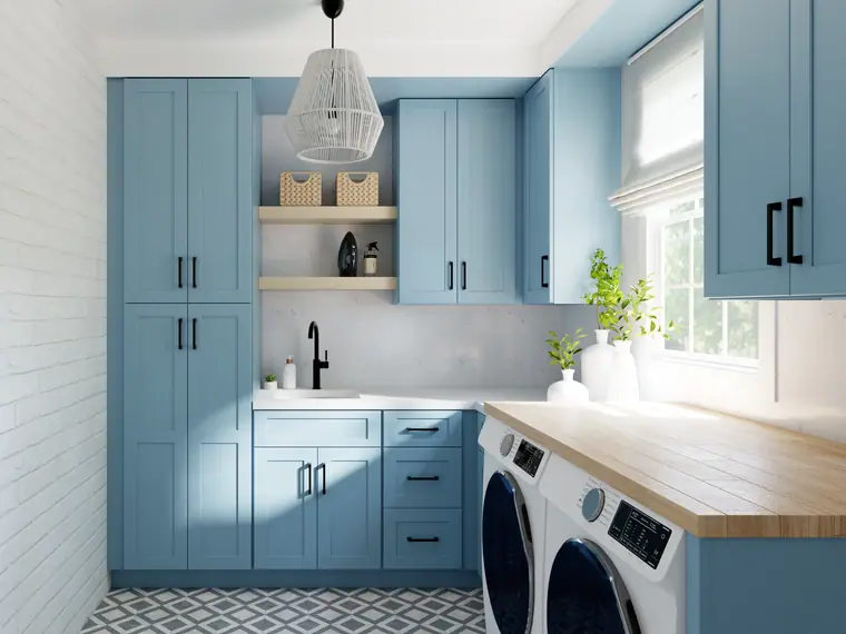 Soft blue Fabuwood kitchen and laundry cabinetry
