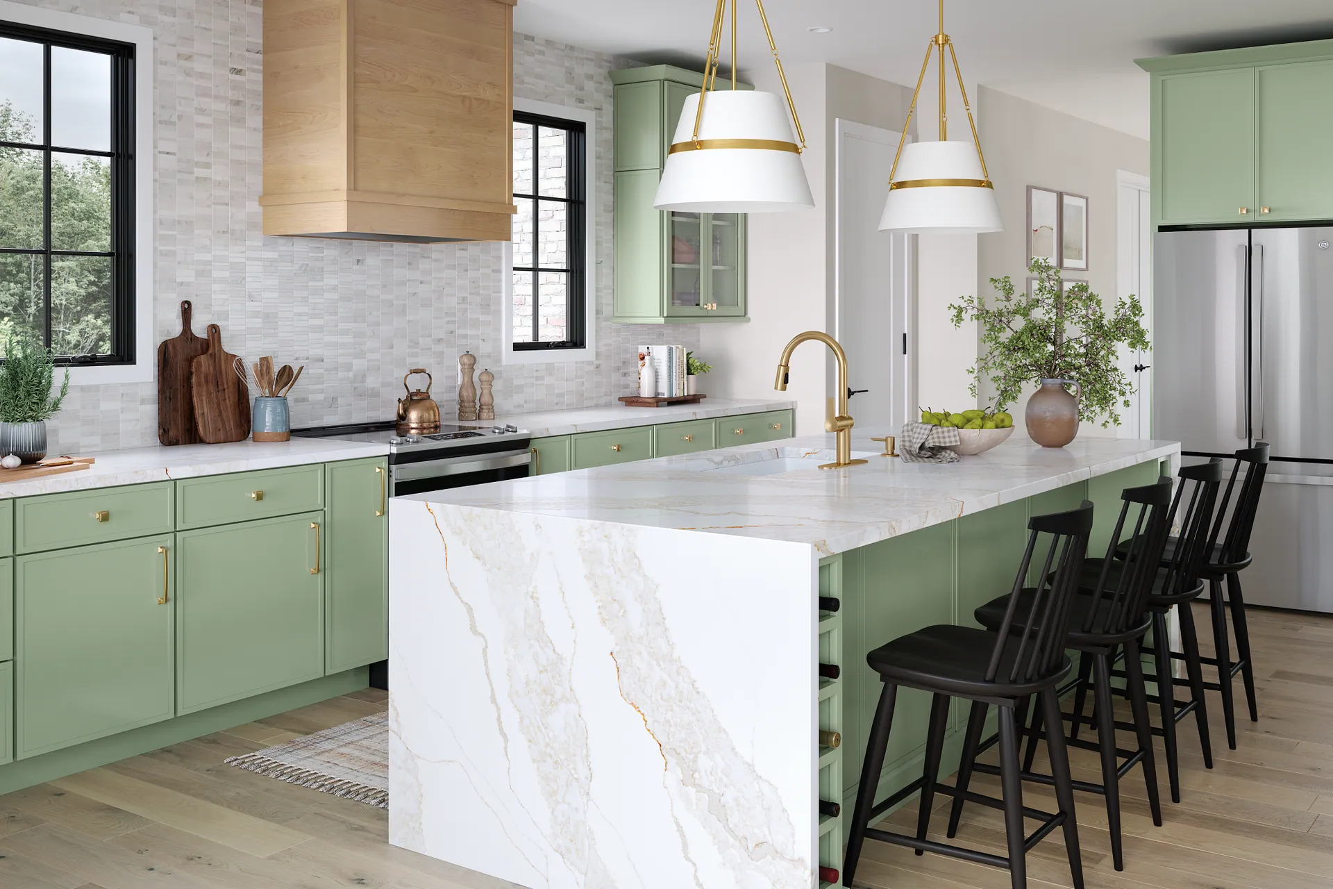Green kitchen with a white waterfall-edge quartz island