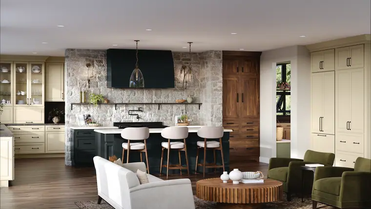Transitional kitchen with cream cabinetry, a navy island, and a stone backsplash