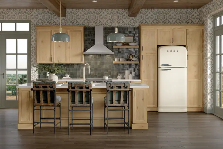 Driftwood kitchen with a retro fridge and island stools