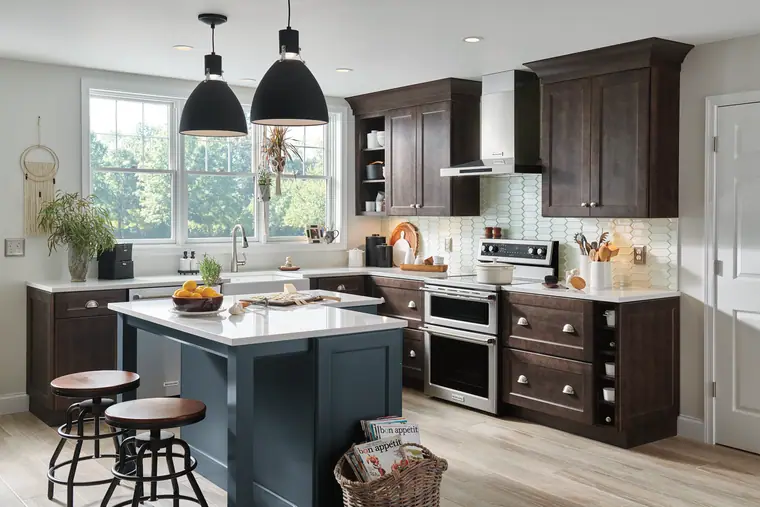 Moody espresso kitchen with a navy island and black pendants