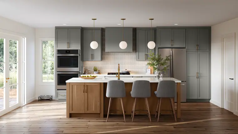 Wide gray kitchen with a wood island and double ovens