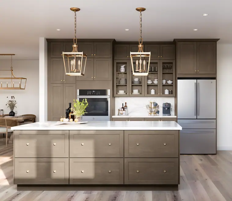 Elegant taupe kitchen with gold pendant lighting and a marble island