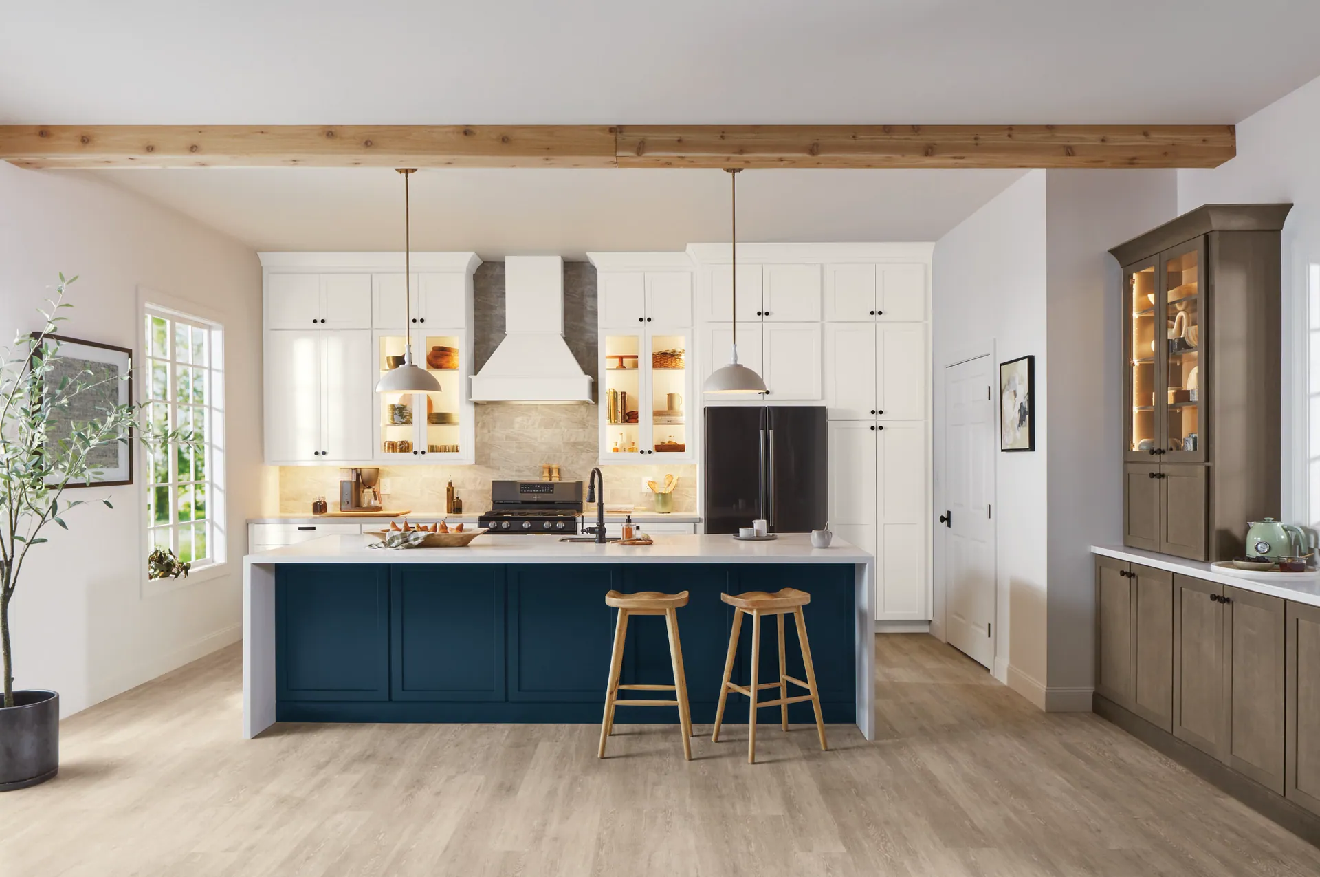 Transitional kitchen with white cabinetry and a navy island under a wood-plank ceiling