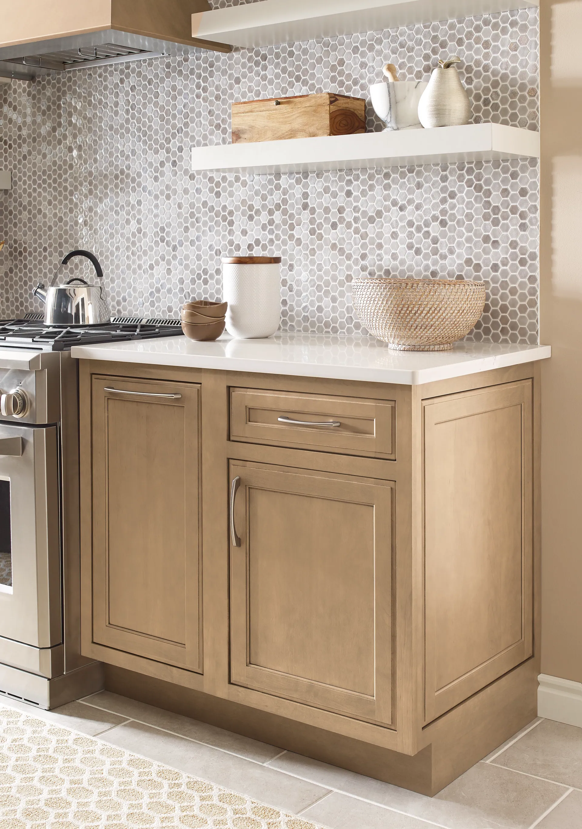 Warm wood kitchen island with a mosaic backsplash