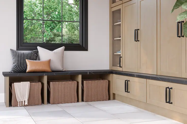 Maple mudroom with a window seat and storage baskets