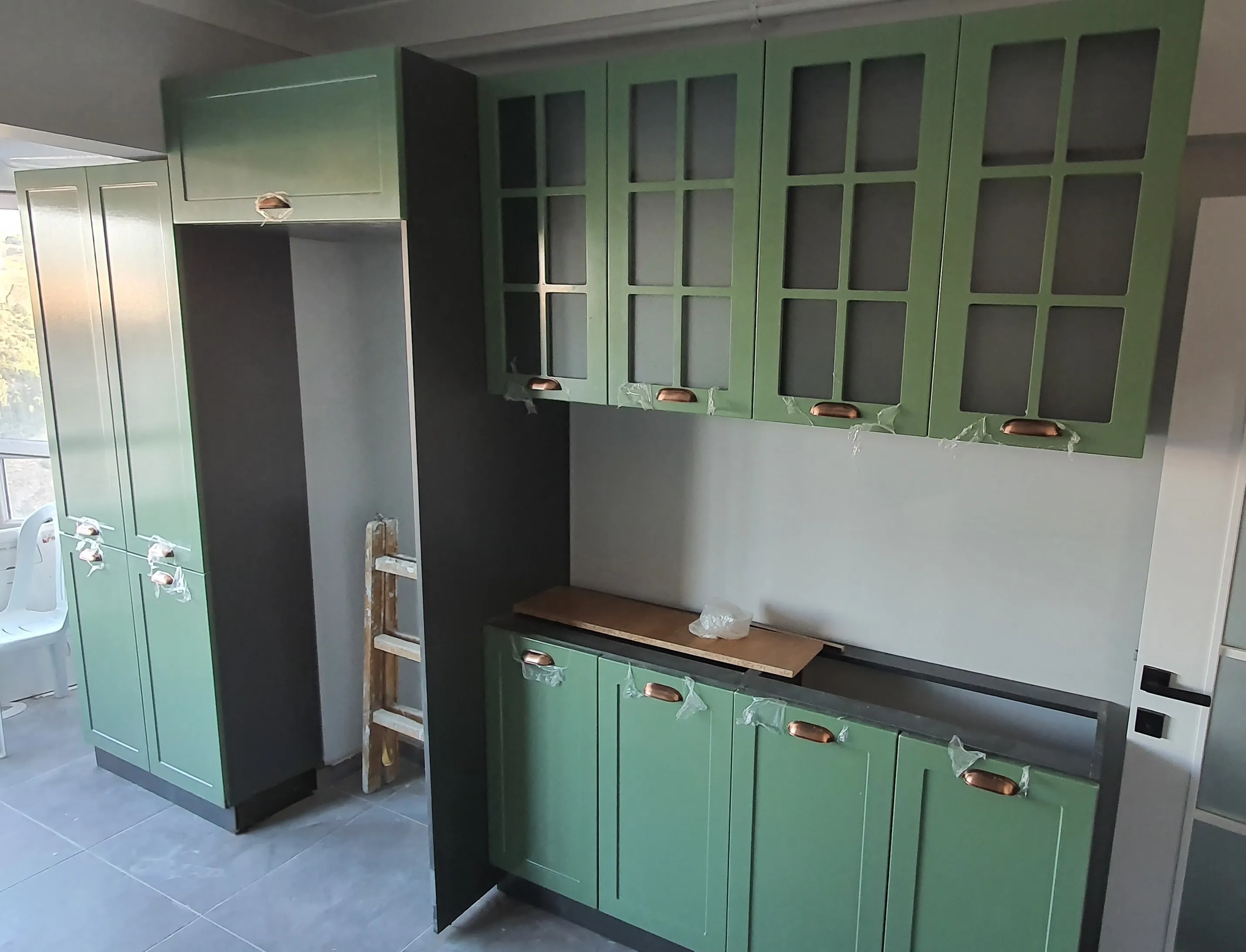 Kitchen island with custom cabinetry by Finemark Cabinetry